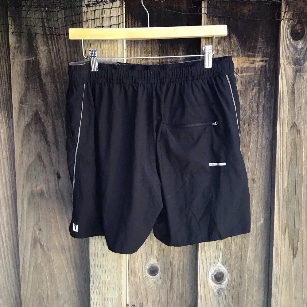 Vuori Black Athletic Shorts with Light Gray Drawstring